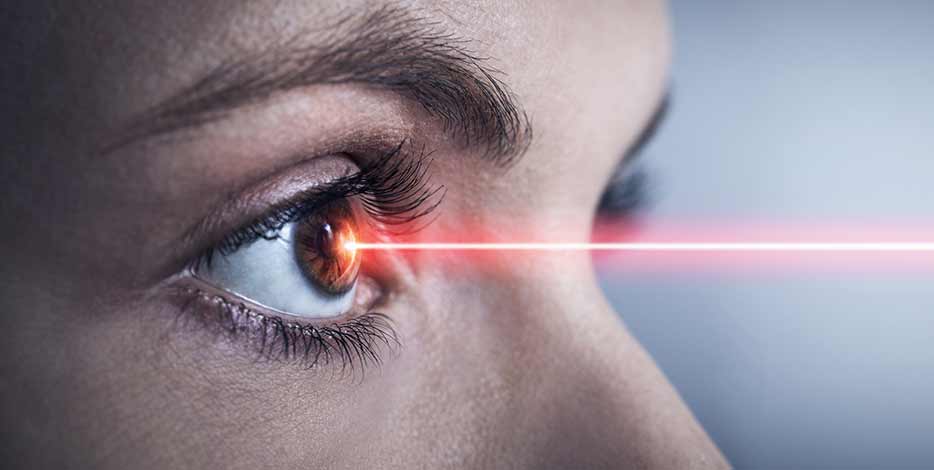 Female patient receiving laser eye surgery 
