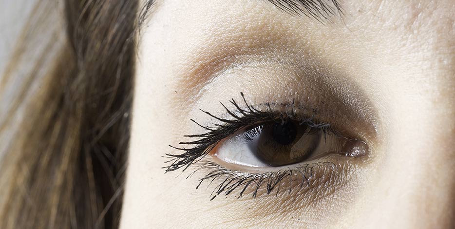 drooping eyelid or ptosis close up of woman's eye