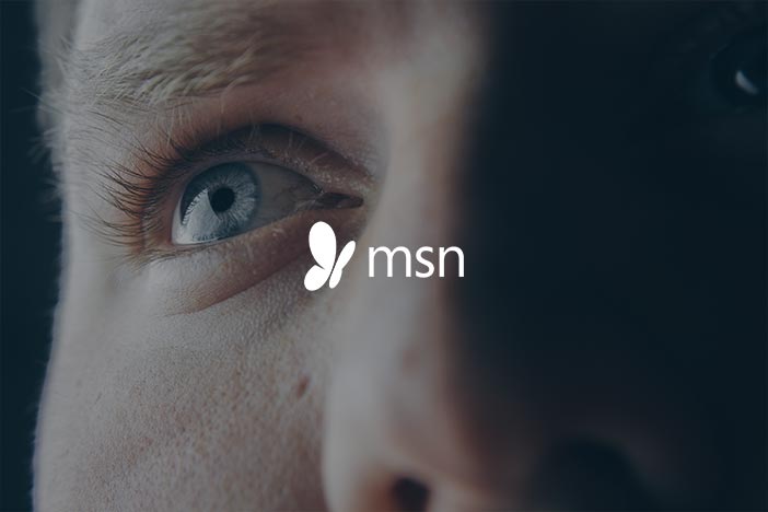 Man stares upwards with MSN logo superimposed on top.