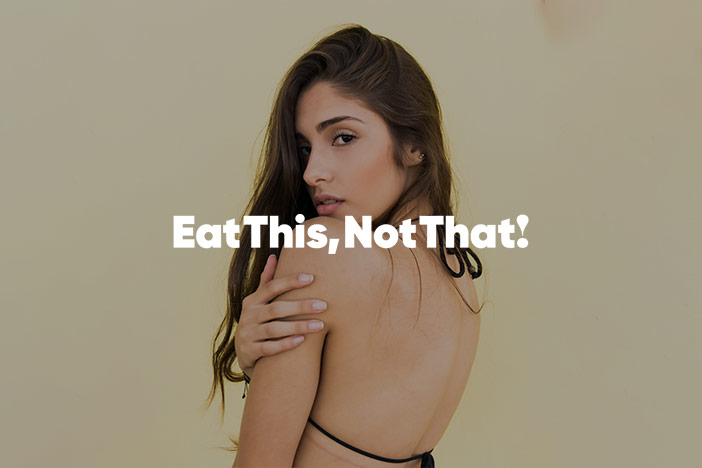 A beautiful woman looks over her shoulder towards the camera lens. The 'Eat This, Not That' magazine logo is superimposed on top.
