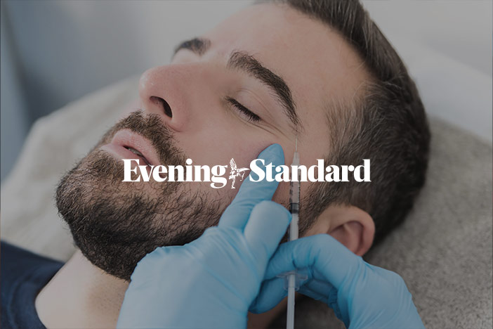 A middle aged man is having a 'tweakment' performed with a needle being held towards his eyebrow corner for a Botox injection. An 'Evening Standard' logo is superimposed on top.