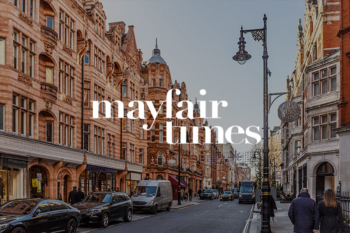 A street in London's Mayfair with elegant archetecture. The 'Mayfair Times' logo is superimposed on top. 