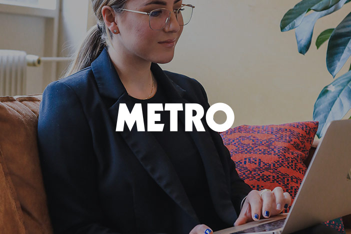 A young professional female browses on a laptop wearing eyewear. 'Metro' logo is superimposed in top.