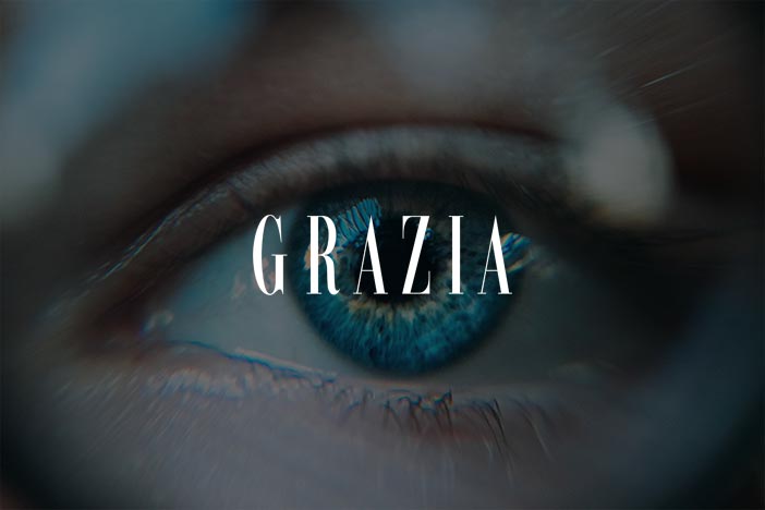 Close-up of a blue eye with the word 'Grazia' overlaid.