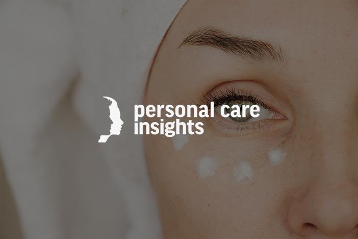 Applying eye cream – Personal Care Insights feature Close-up of a woman’s eye area with visible eye cream applied to her skin, suggesting a gentle skincare routine for sensitive eyes.